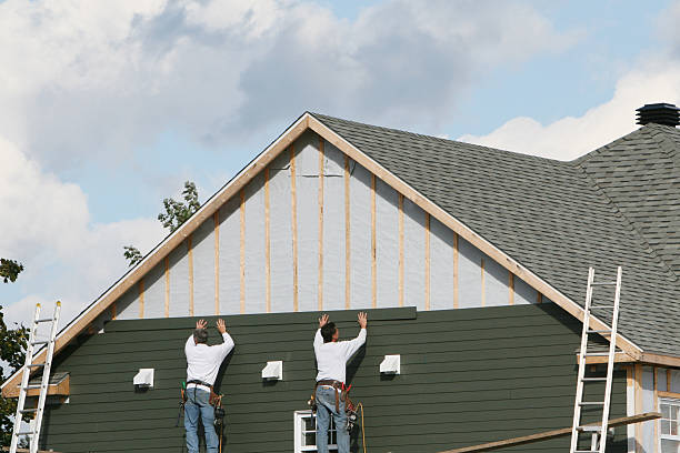 Professional Siding Replacement technician working in Rock Creek, MN